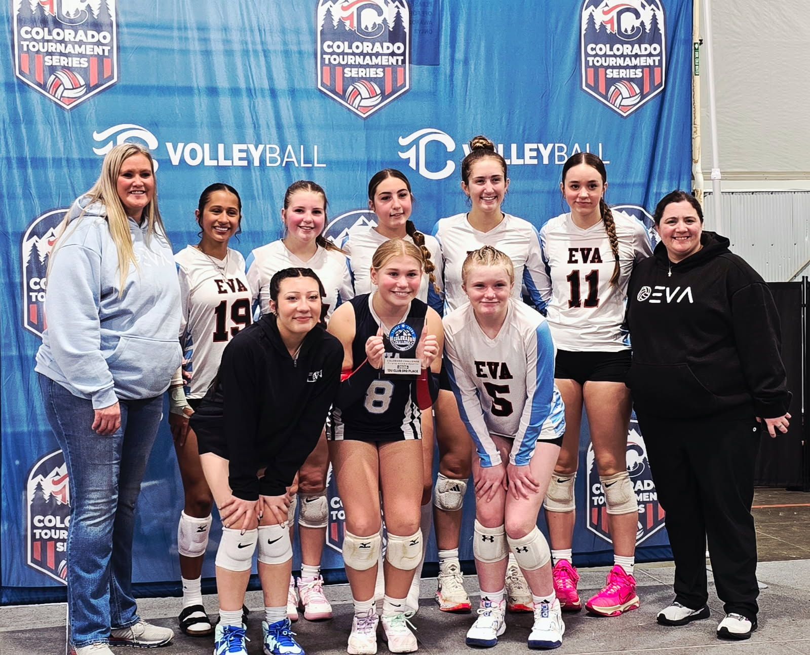 EVA team and coaches with a third place award at a Colorado Tournament Series event